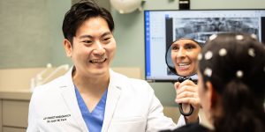Dr. Joon Park and a smiling patient at J.P Prosthodontics in Fullerton, CA