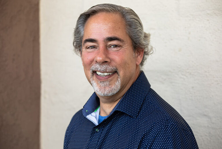 Smiling dental patient at J.P Prosthodontics in Fullerton, CA