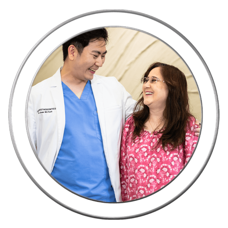Dr. Joon Park with a happy patient at J.P Prosthodontics in Fullerton, CA
