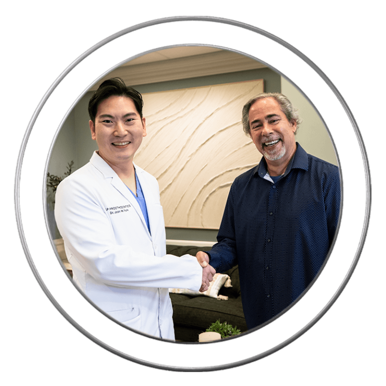 Dr. Joon Park and a smiling patient at J.P Prosthodontics in Fullerton, CA