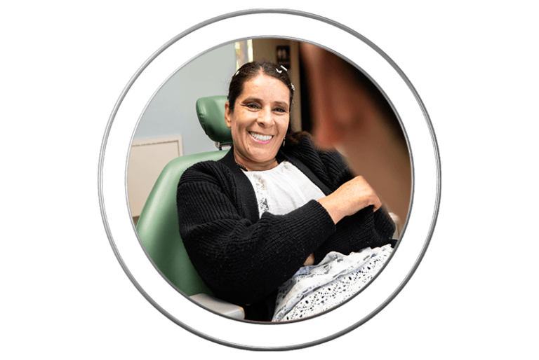 Smiling dental patient after treatment at J.P Prosthodontics in Fullerton, CA